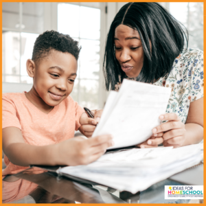 mom and son getting organized for homeschool year